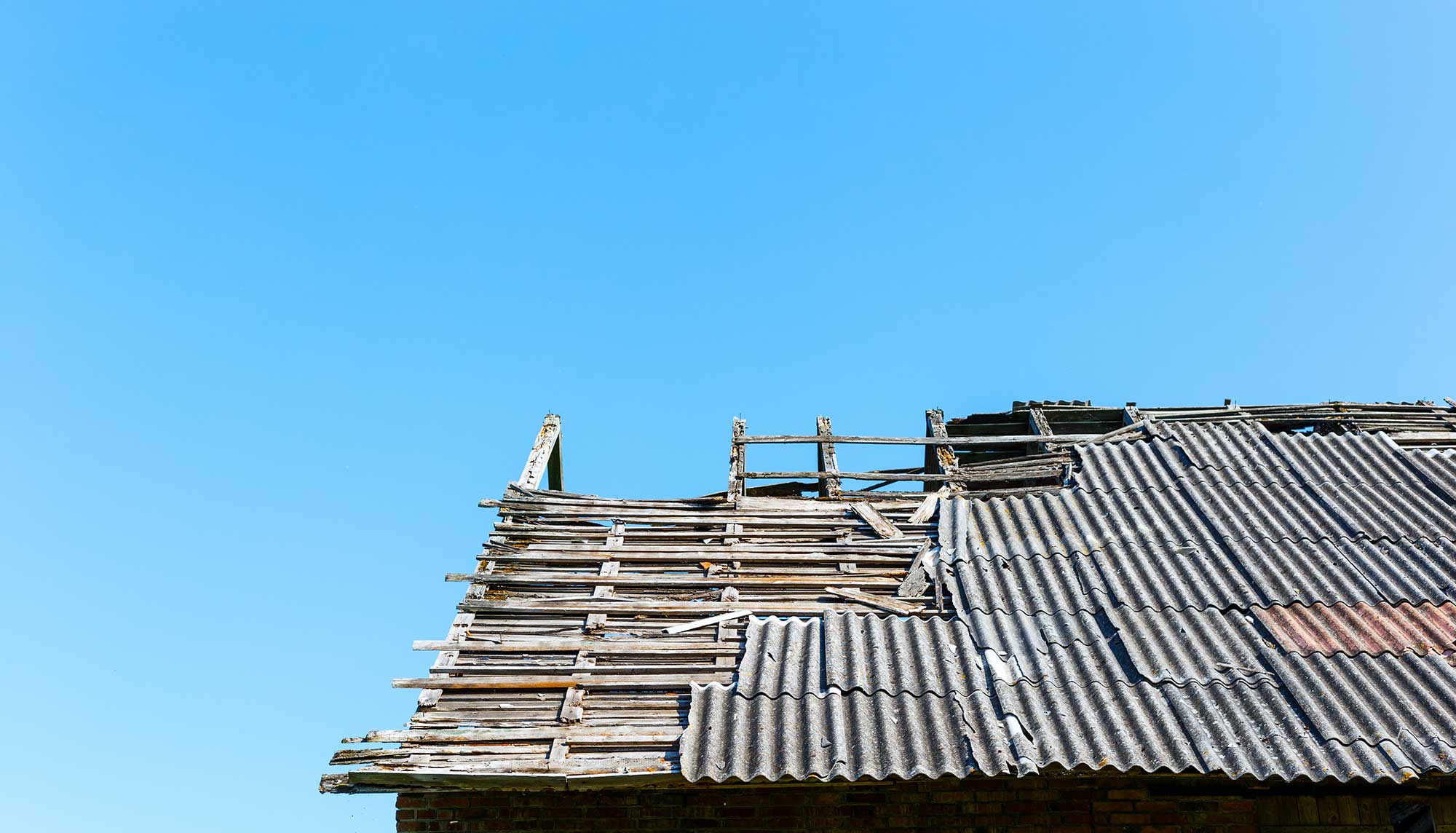 Removing asbestos corrugated sheets