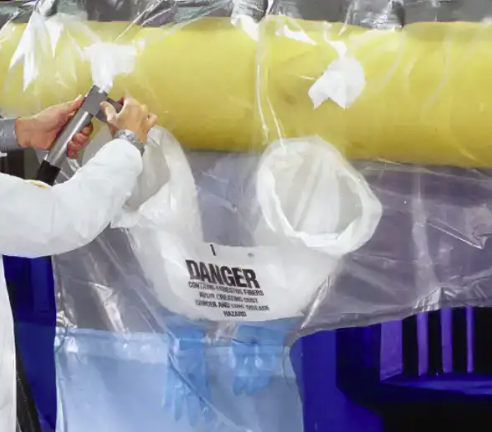 Glove bag: safely removing asbestos around pipes