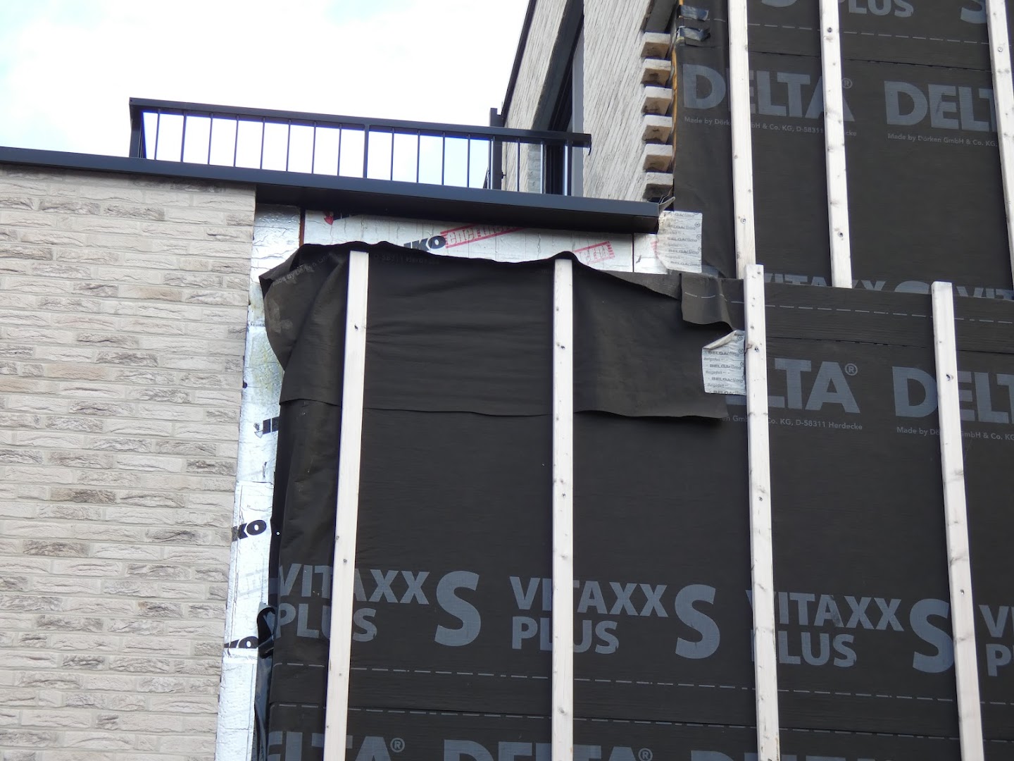 Foto van Adak Nv in Dendermonde — Dakdekker (foto 2)