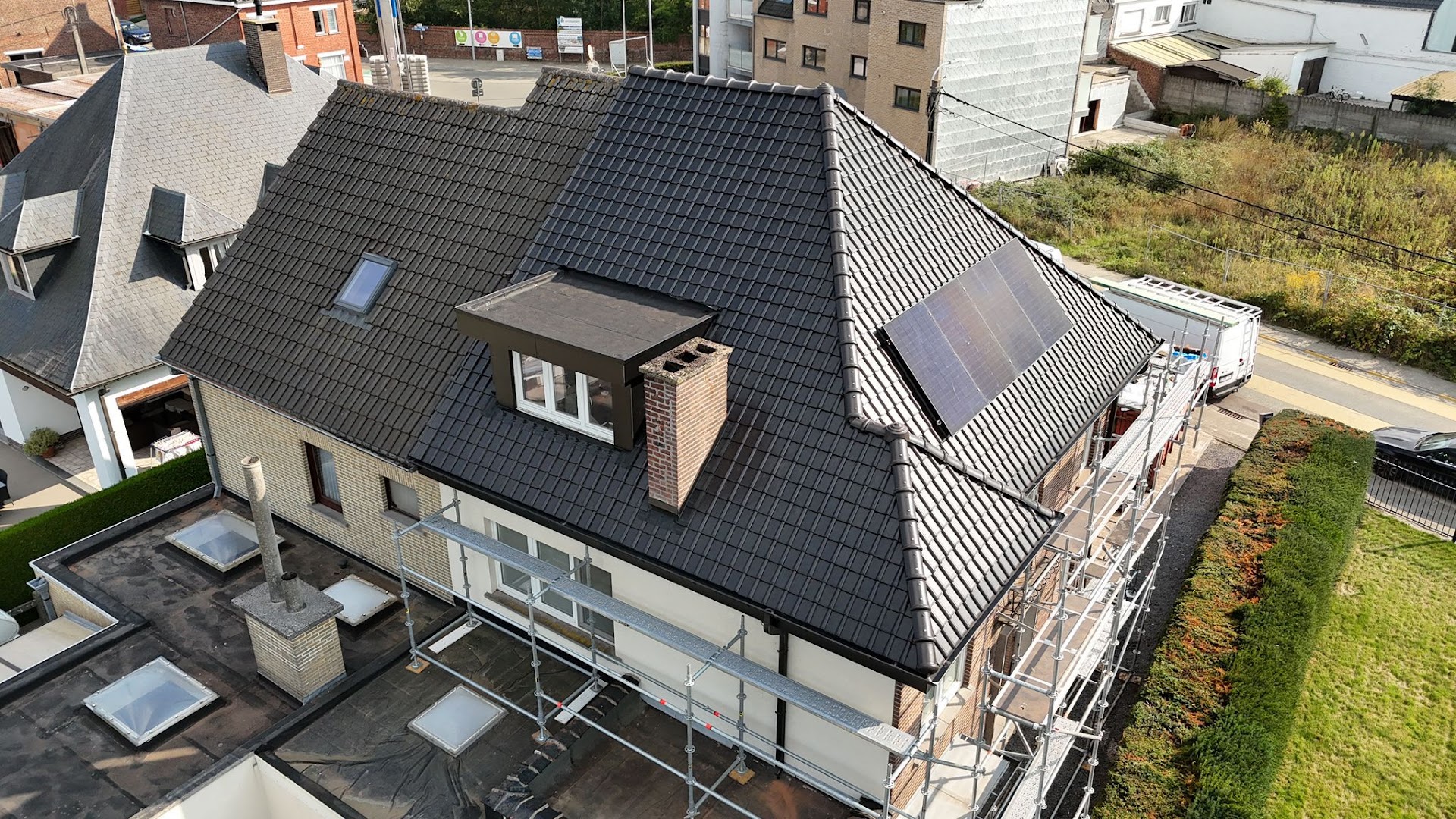 Foto van Donzo in Merelbeke-Melle — Dakdekker (foto 2)