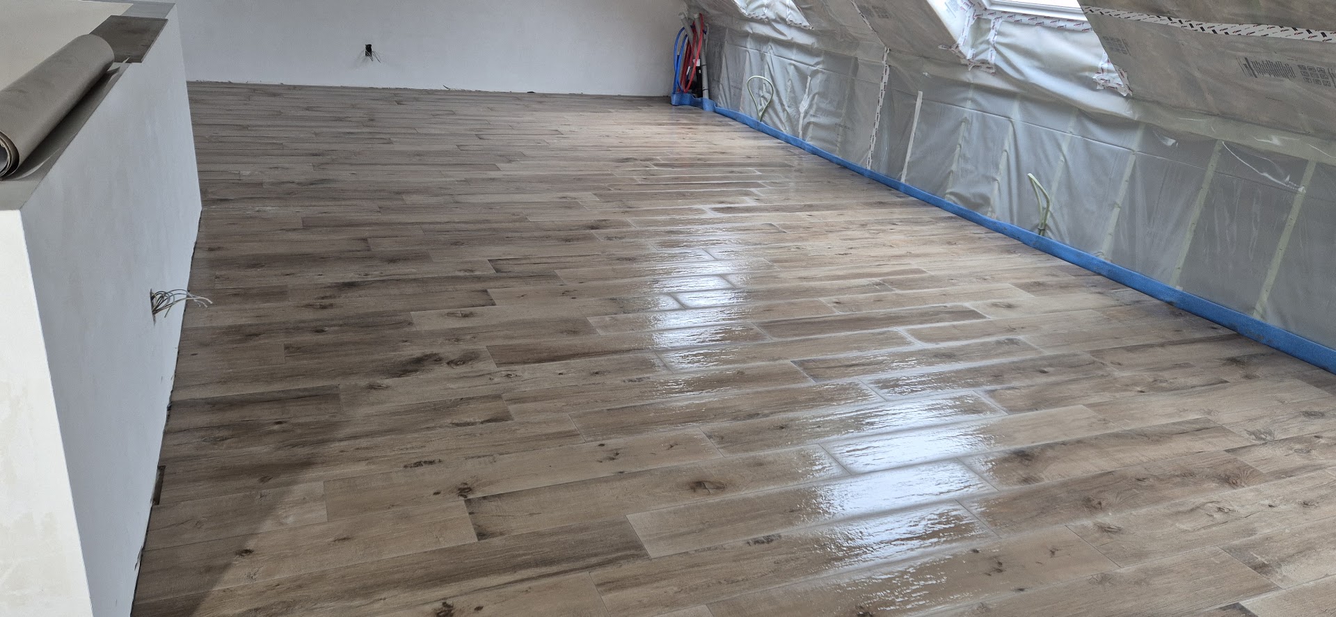 Foto van VRD Renovaties in Lommel, Vloerenlegger (foto 2)