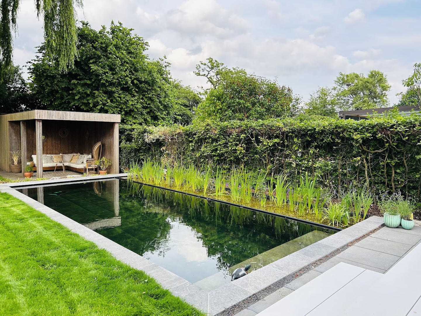 Foto van Gostar Zwemvijver - Biopool - Tuinarchitectuur - Totaalprojecten in Ranst, Zwemvijverbouwer (foto 3)